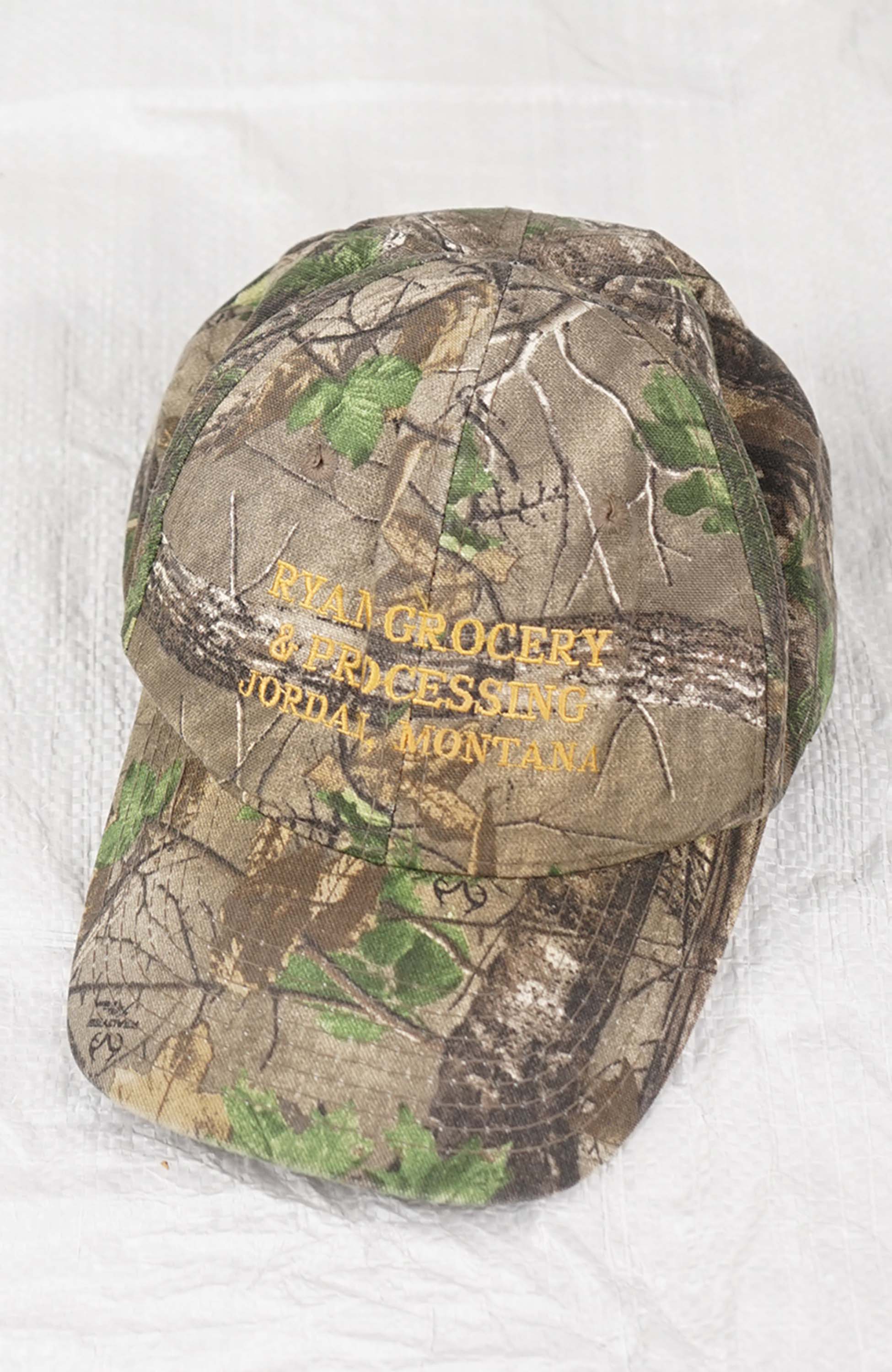 VINTAGE RYAN GROCERY & PROCESSING JORDAN' MONTANA REAL TREE HAT